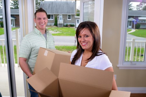 Professional furniture removals team handling a sofa move in Hillingdon