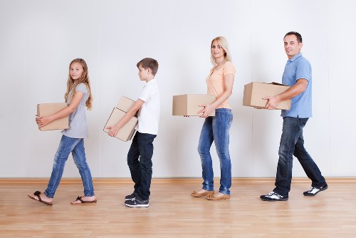 Packed boxes and furniture ready for transport in a Hillingdon home move